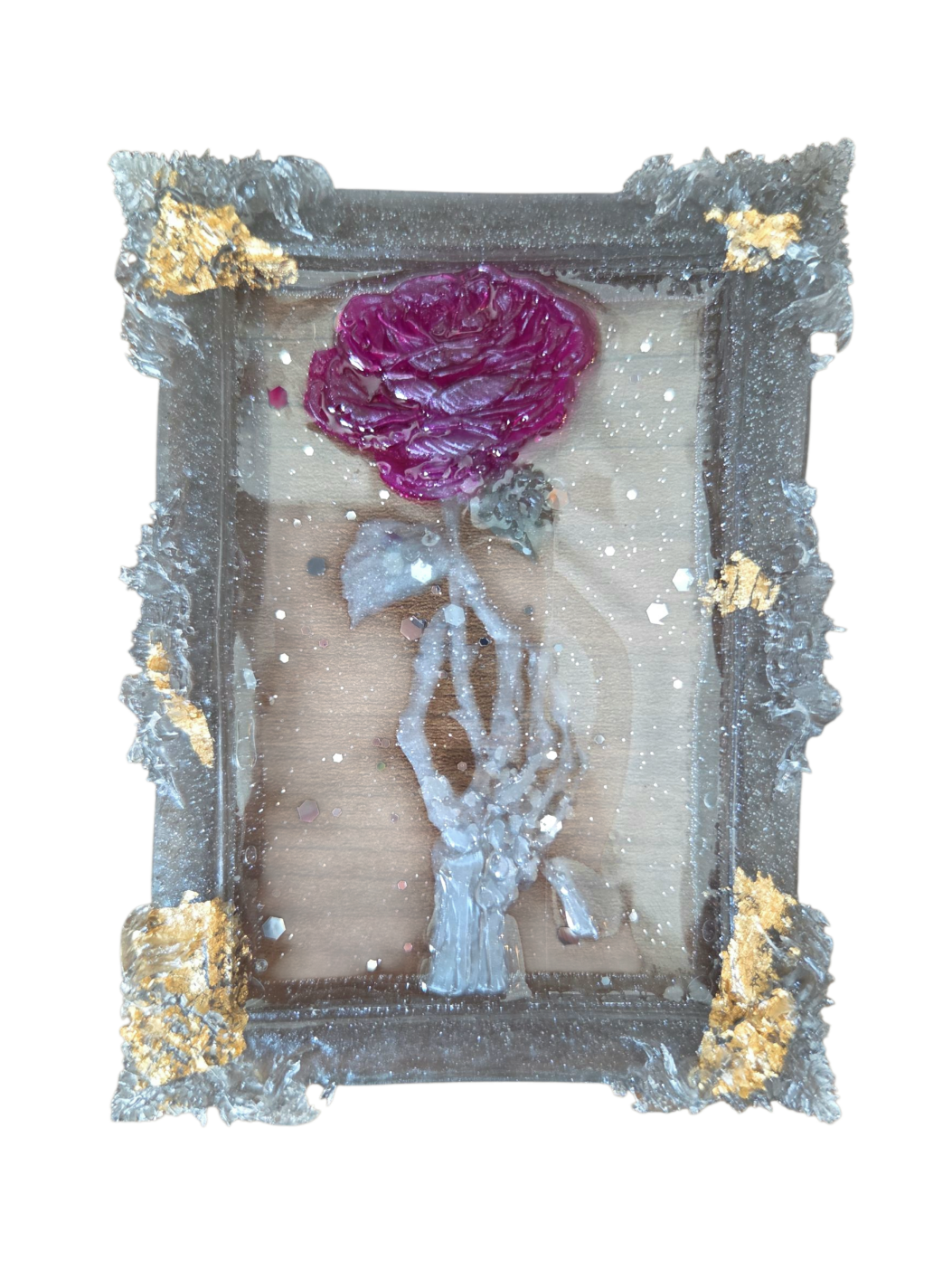 Large skeleton hand holding a rose (magnets)