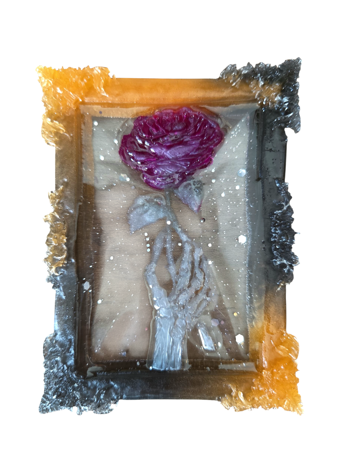 Large skeleton hand holding a rose (ornament)