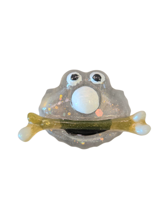 Elmo eats a femur (magnet)